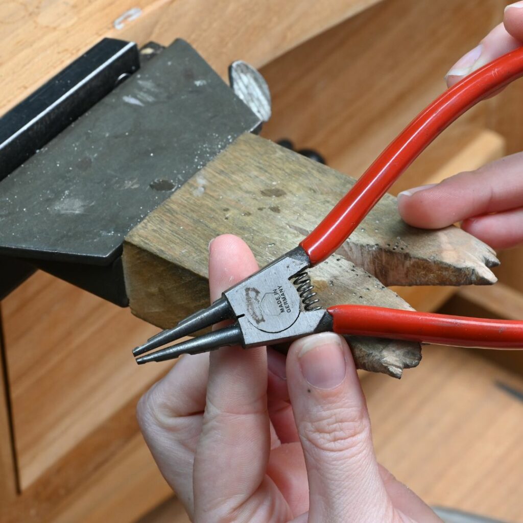 reverse action ring opening pliers