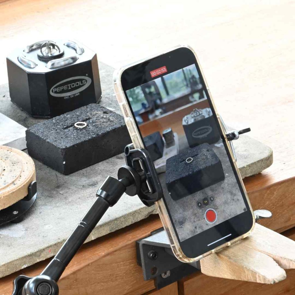 Cell phone being used for filming jewelry making classes Cell phone being used for filming jewelry making classes