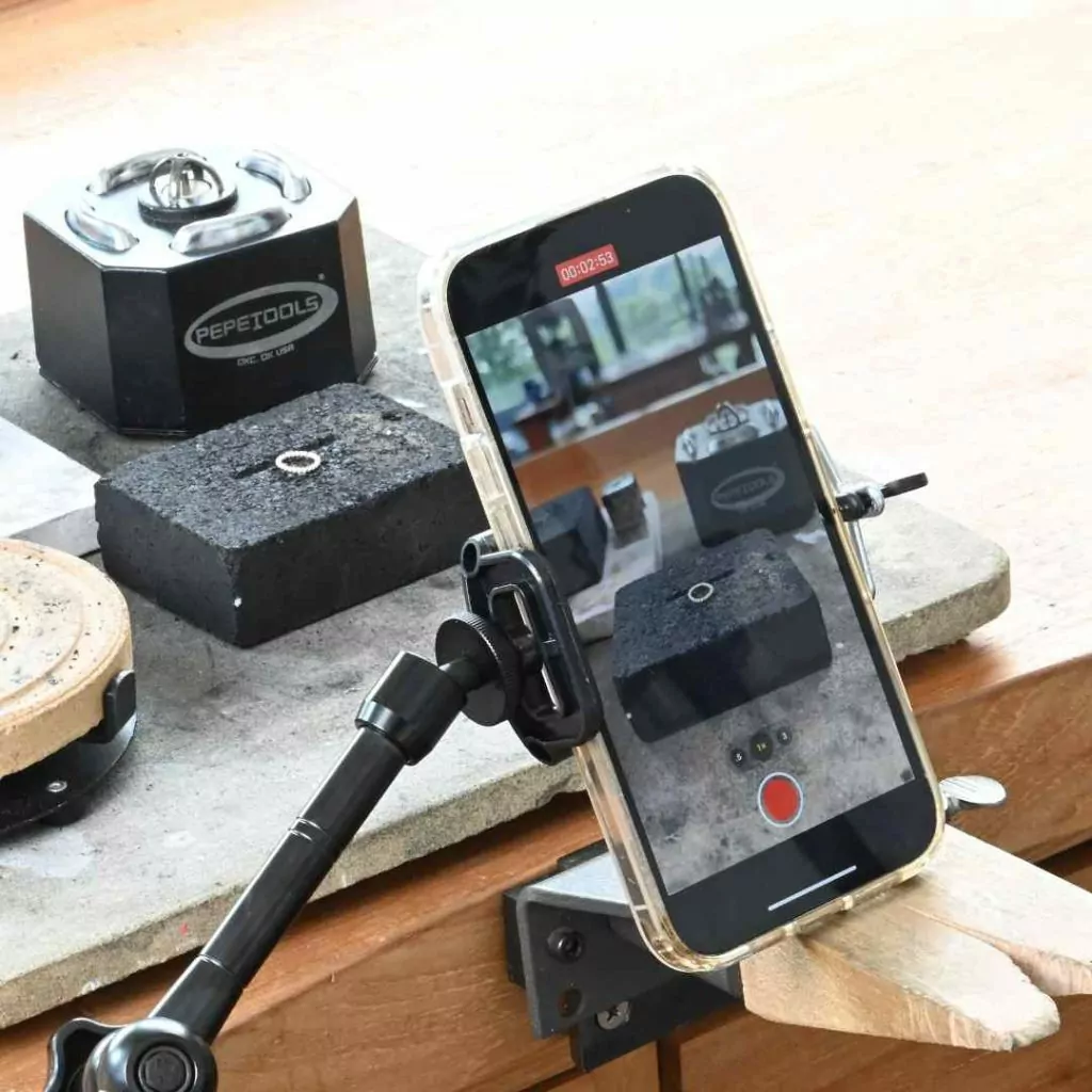 Cell phone being used for filming jewelry making classes