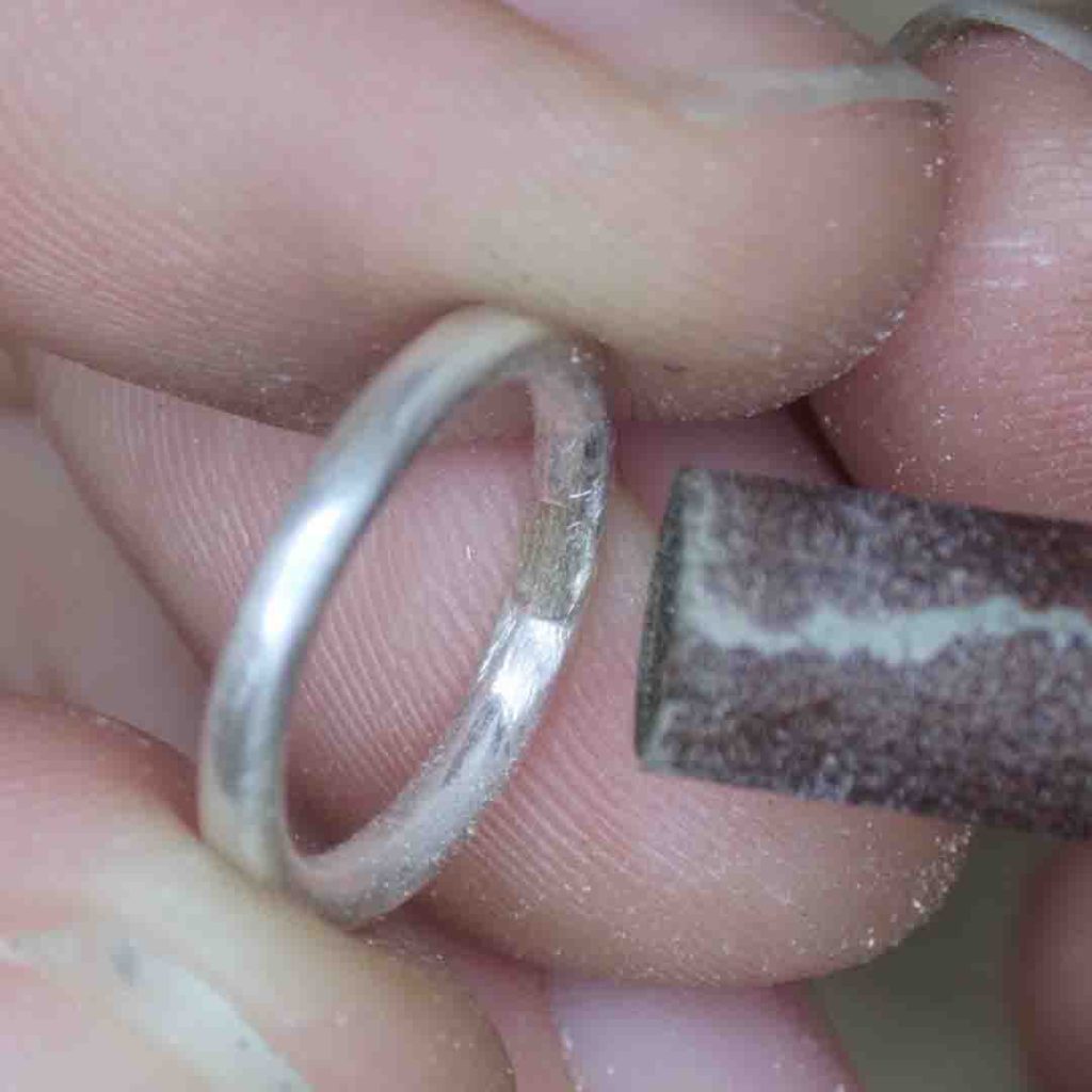 Cleaning up solder with sandpaper