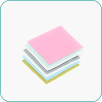 Stack of multicolored sticky notes on a white background.
