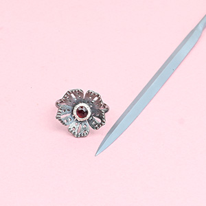 barette needle file for jewelers and metalsmiths with handmade silver flower ring with a tourmaline center stone barette needle file for jewelers and metalsmiths with handmade silver flower ring with a tourmaline center stone