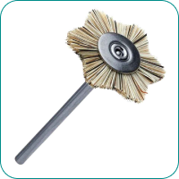 A brush attachment with radial bristles on a cylindrical metal rod.