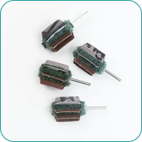 Four metal scrubbing pads on shafts, arranged on a white background.