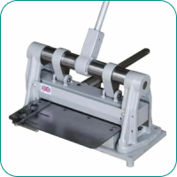 Manual metal sheet cutting machine with gray body and lever handle.