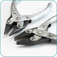 Two metal wire cutters with black blades on a white background.