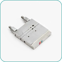 A small metallic mechanical component with two protruding threaded connectors.
