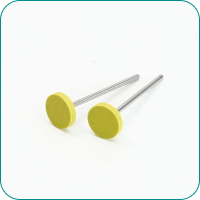 Two yellow-headed drawing pins with metal shafts on a white background.