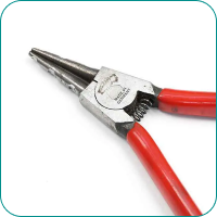 Red-handled pliers on a white background.
