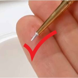 Paintbrush with paint for rendering diamonds and jewelry design