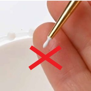 Paintbrush with paint for rendering diamonds and jewelry design