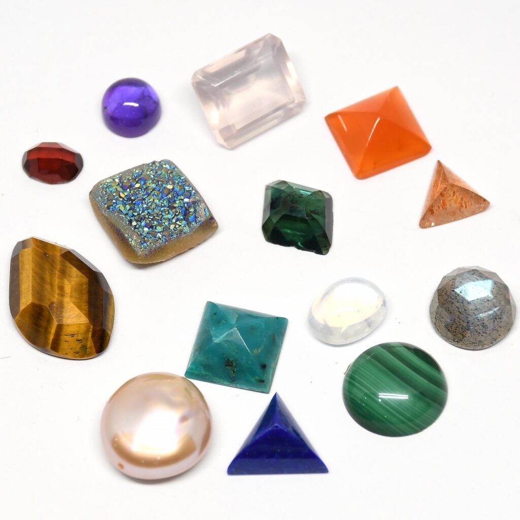 Selection of gemstones which will be tested for their reaction to liver of sulfur.