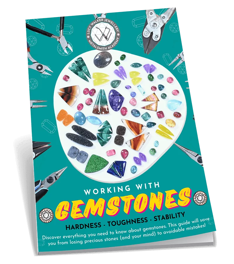 Book titled "Working with Gemstones" featuring assorted gemstones on the cover.  From a guide on natural gemstones for jewelry making